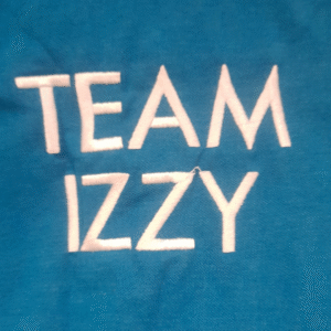 Back of polo shirt with slogan ''Team Izzy'