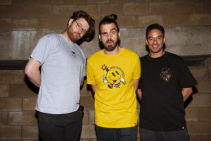 The Scribes Boombox smile for a photograph